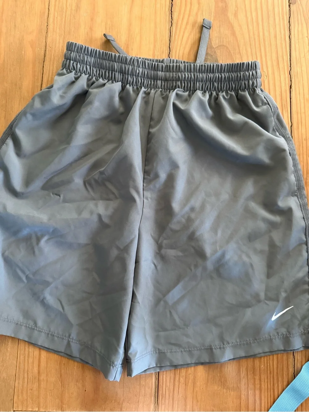 Nike Light Gray Athletic Shorts with White Swoosh
